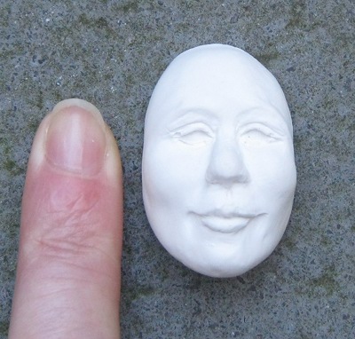 Tiny plaster face cr Lizzie Morris