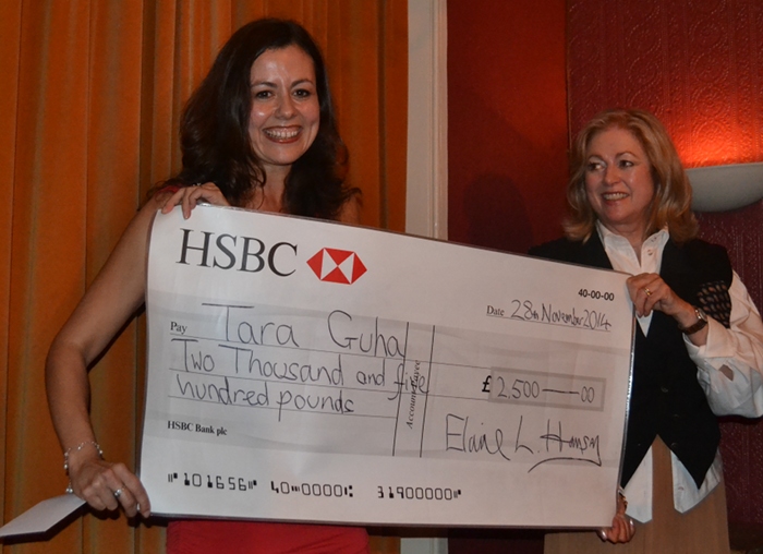Luke Bitmead’s mother Elaine Hanson presents Tara with her prize