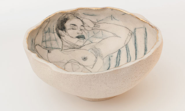 yurim-gough-korean-ceramic-artist-lying-on-the-stripes-angle-view