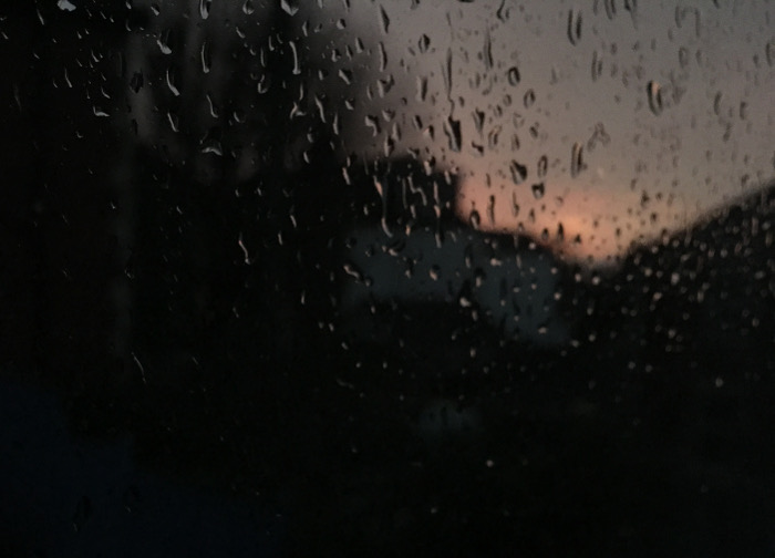 Rain on window by Judy Darley