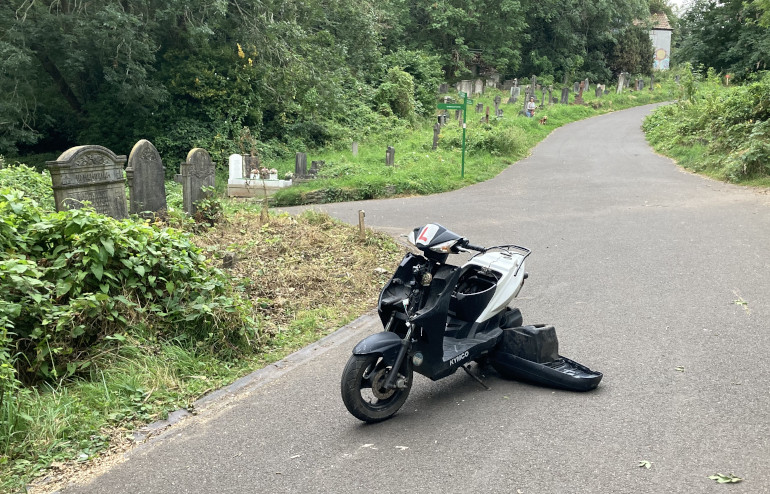 Moped in Arnos Vale. by Judy Darley