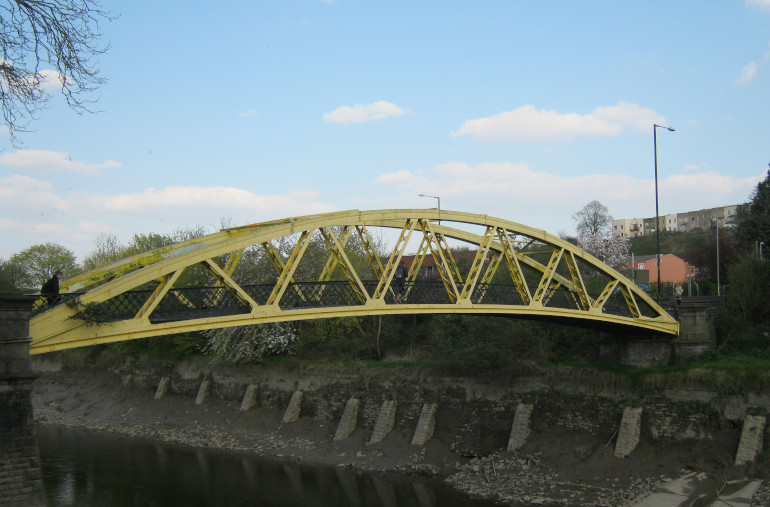 Banana Bridge cr Judy Darley. Shows a yellow bridge crossing a Bristol river.