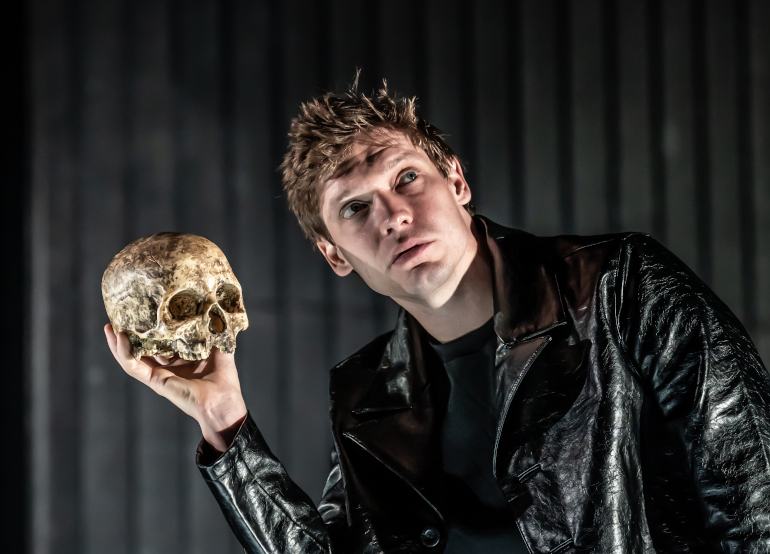 Billy Howle as Hamlet holding skull1. Photo by Marc Brenner