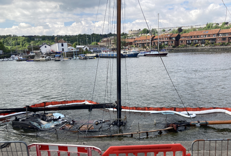 Burntout boat. Photo by Judy Darley