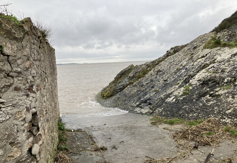 High tide swallows a Clevedon beach by Judy Darley